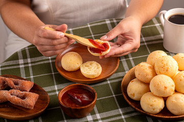 Typical Brazilian Breakfast. Humanized shoot. Pão de Queijo. Guava cream.