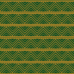 Indian bandhni style chevron pattern, gold on green. 