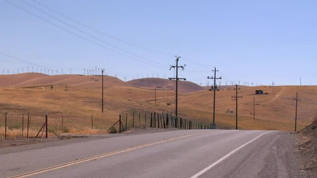 Windmills in California Along a Road