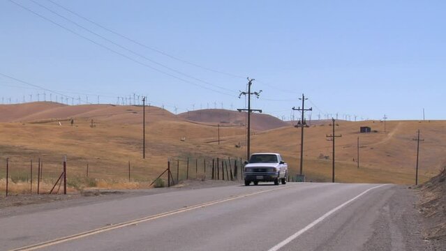 Windmills in California Along a Road