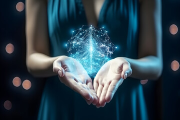 Close up of female hands holding glowing polygonal figure in palm