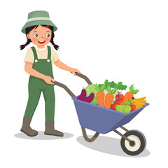 Cute little girl gardener pushing wheelbarrow full of fruits and vegetables