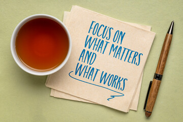 focus on what matters and what works - inspiraitonal writing on a napkin, productivity and priority...