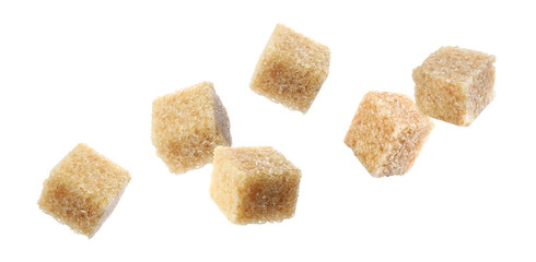 Cubes of brown sugar flying on white background