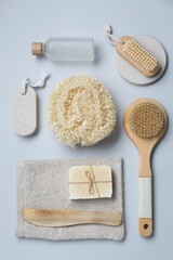 Fototapeta na wymiar Bath accessories. Flat lay composition with personal care products on grey background