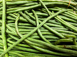 Close-up shot of Organic green Yardlong beans in th market