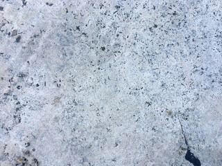 A bright and rough concrete backdrop on a white background.