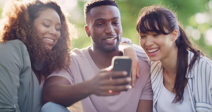 Phone, meme or happy people in park on social media to chat on internet post or website notification. Laughing, news search or funny friends in nature texting, networking or typing online on blog