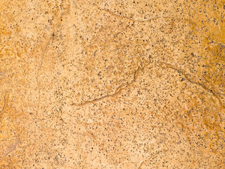 Dark concrete texture with a crumpled paper backdrop