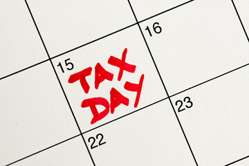April 15th highlighted in red as Tax Day on a white calendar for income tax filing reminder, flat...