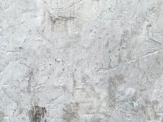 Grunge backdrop featuring an abstract paint pattern on concrete.