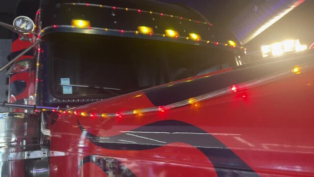close-up light decorated red truck