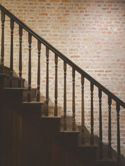 The play of light and shadow on the empty stairway enhances the overall aesthetic appeal of the modern design.