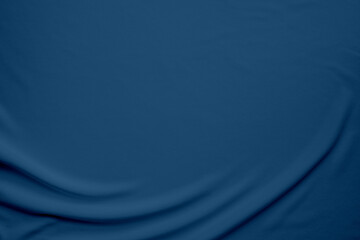 Dark blue silk fabric abstract background. Blue linen texture background concept