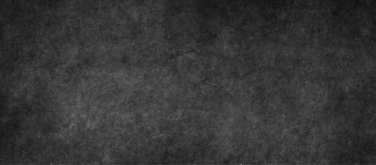 Obraz premium abstract grunge black background Overlay texture or stone wall, dark color cement floor or concrete texture, Art stylized texture banner or cover or card, grunge texture dark gray charcoal blackboard.