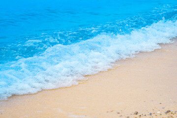 Summer sea natural background blue surface, clear water with ripples and splashes. water waves in...