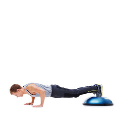 Man, push up for fitness and balance on bosu ball for core training, muscle and workout on white background. Exercise equipment, strength and endurance with mockup space and strong athlete in studio