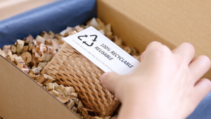 Eco vendor go green packaging parcel carton box in net zero waste store asian seller retail shop....