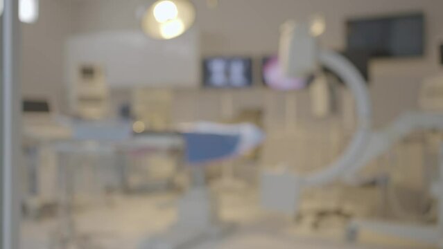 Blurred background of modern equipment in operating room at hospital