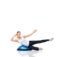 Fototapeta premium Woman, athlete and fitness with bosu ball for core training and muscle, balance and workout on white background. Exercise equipment, strength and endurance with mockup space and strong in studio
