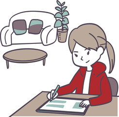 リビングダイニングで勉強する女性