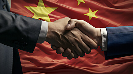 中国国旗の前で握手する様子 - obrazy, fototapety, plakaty