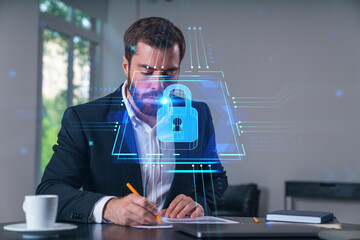 Calm businessman in formal wear signing contract at office workplace with coffee cup, laptop and notebook. Concept of successful deal, agreement, partnership, documents. Lock icons.