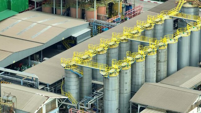 Lubricant plant: Manufacturing hub for oils and greases, vital for machinery, automobiles. Cutting-edge technology, efficient production. Tribology and fluids concept. Bird's eye view by drone.