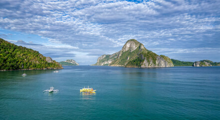Obraz premium Small boats in the tropical harbor at El Nido town, Palawan, Philippines
