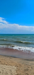 Mountain lake, clean transparent water. Coastline. Kyrgyzstan, Lake Issyk-Kul. natural background....