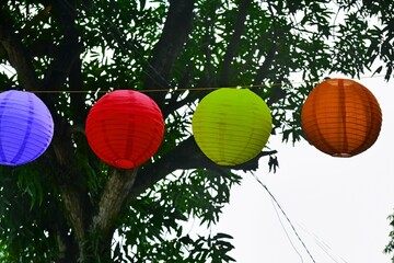 Fototapeta na wymiar The colorful lanterns in Rainbow Village add to the beauty