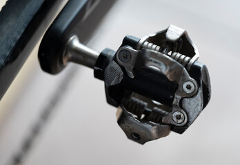Detail of a black and gray SPD mountain bike pedal - obrazy, fototapety, plakaty