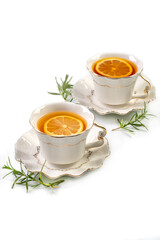 Tea with a lemon slice in a porcelain cup
