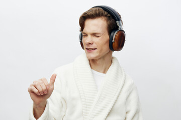 Young man enjoying music wearing headphones