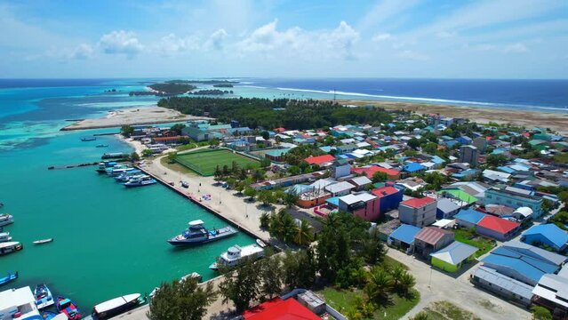 Kuda Huraa Island - Maldives - Aerial view with an opening rotating view over the island town