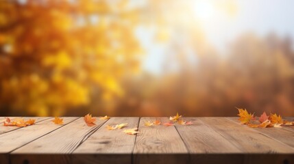  a wooden table with leaves on it in front of a blurry background of leaves on the top of the table.