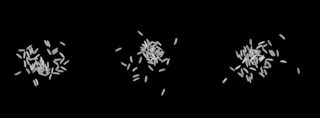 Beautiful raw white organic brown rice grains from top view isolated on black background