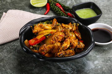 Vietnamese cuisine - fried frog with vegetables