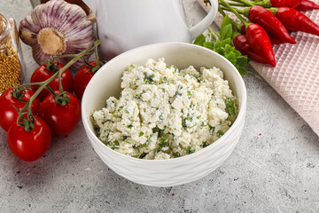 Curd cheese with green herbs