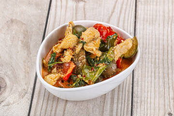 Thai red spicy curry with chicken