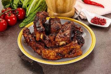 Grilled pork ribs in barbecue sauce