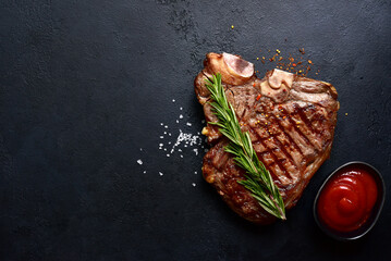  Grilled T-bone beef steak. Top view with copy space. - obrazy, fototapety, plakaty