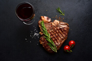 Grilled T-bone beef steak. Top view with copy space.