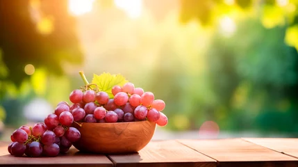 Gordijnen Grapes in a bowl against the backdrop of the garden. Selective focus. © Яна Ерік Татевосян