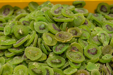 Dried preserved kiwi fruits. Candied fruit slices