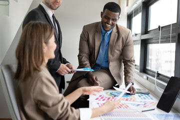 African businessman working with team business at office	