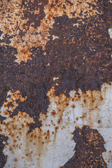 rusty and dirty metal surface with peeling paint.