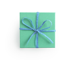 Top view of mint green square present paper box with recycled paper ribbon isolated on white background