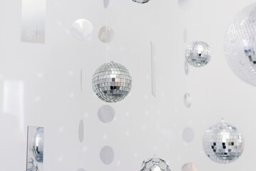 Fototapeta na wymiar Mirror glass disco ball on gray background