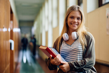 Portrait of happy high school student looking at camera.